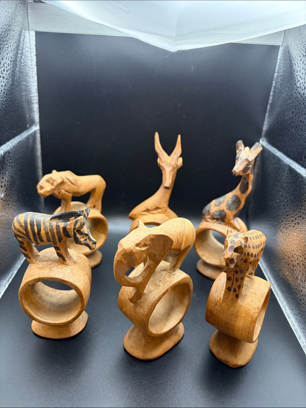 Set of six hand carved African animal napkin rings, never used.